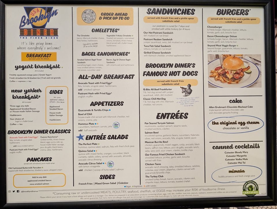 Casual diner tables inside an airport restaurant.